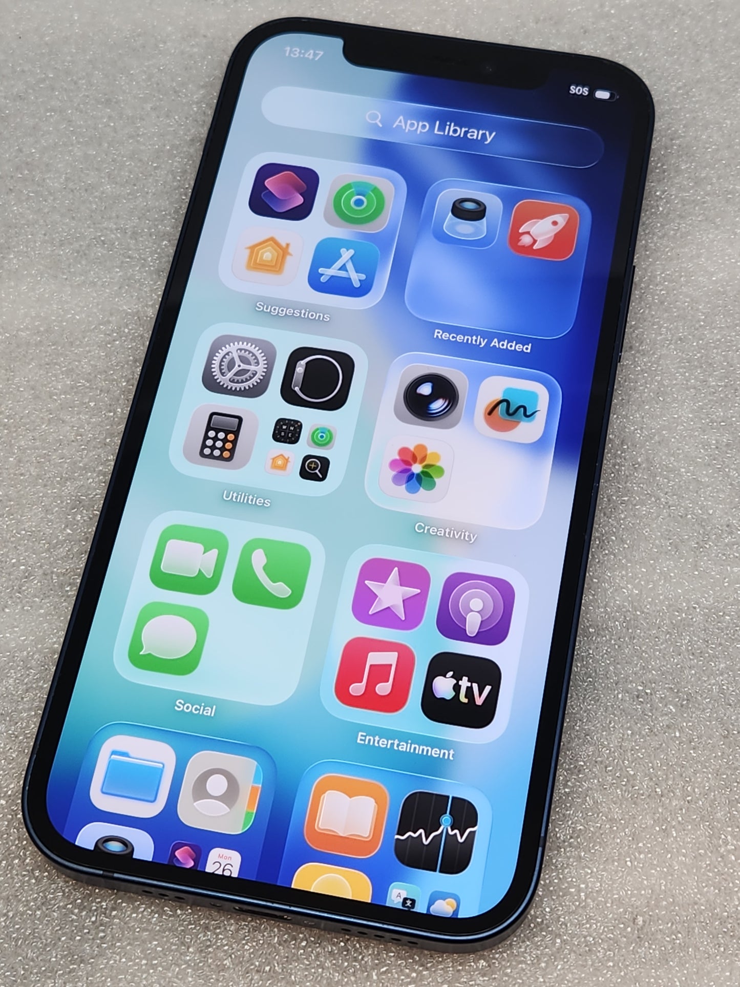 Refurbised iPhone 12. .blue. 64GB. unlocked. iOS 26. battery health 92%