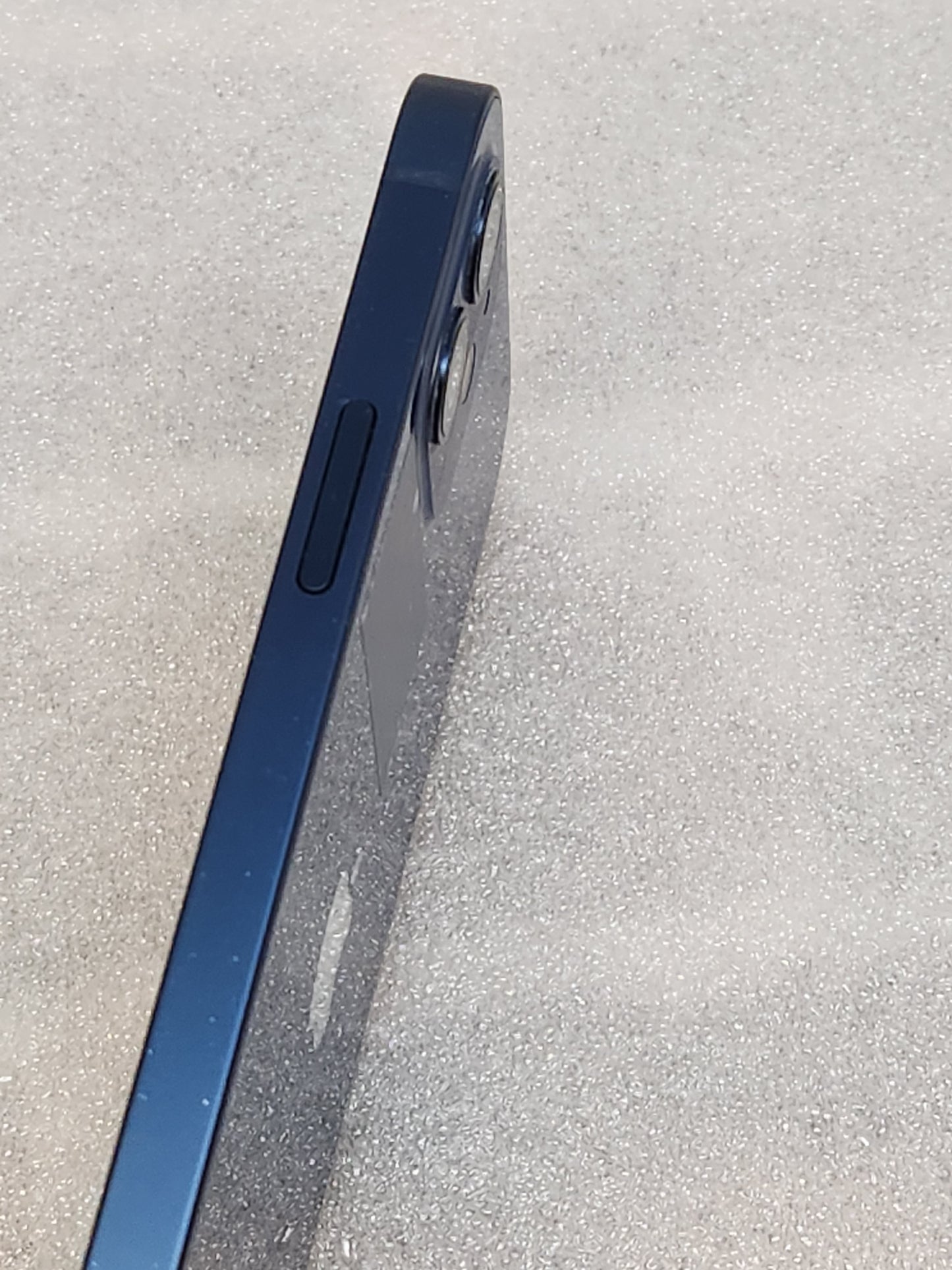 Refurbised iPhone 12. .blue. 64GB. unlocked. iOS 26. battery health 92%